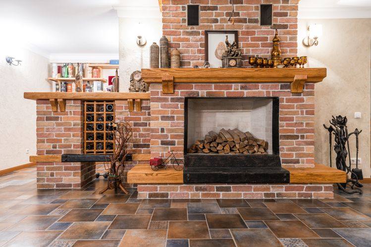 Warm brick fireplace in a California home — professional chimney cleaning and inspection services